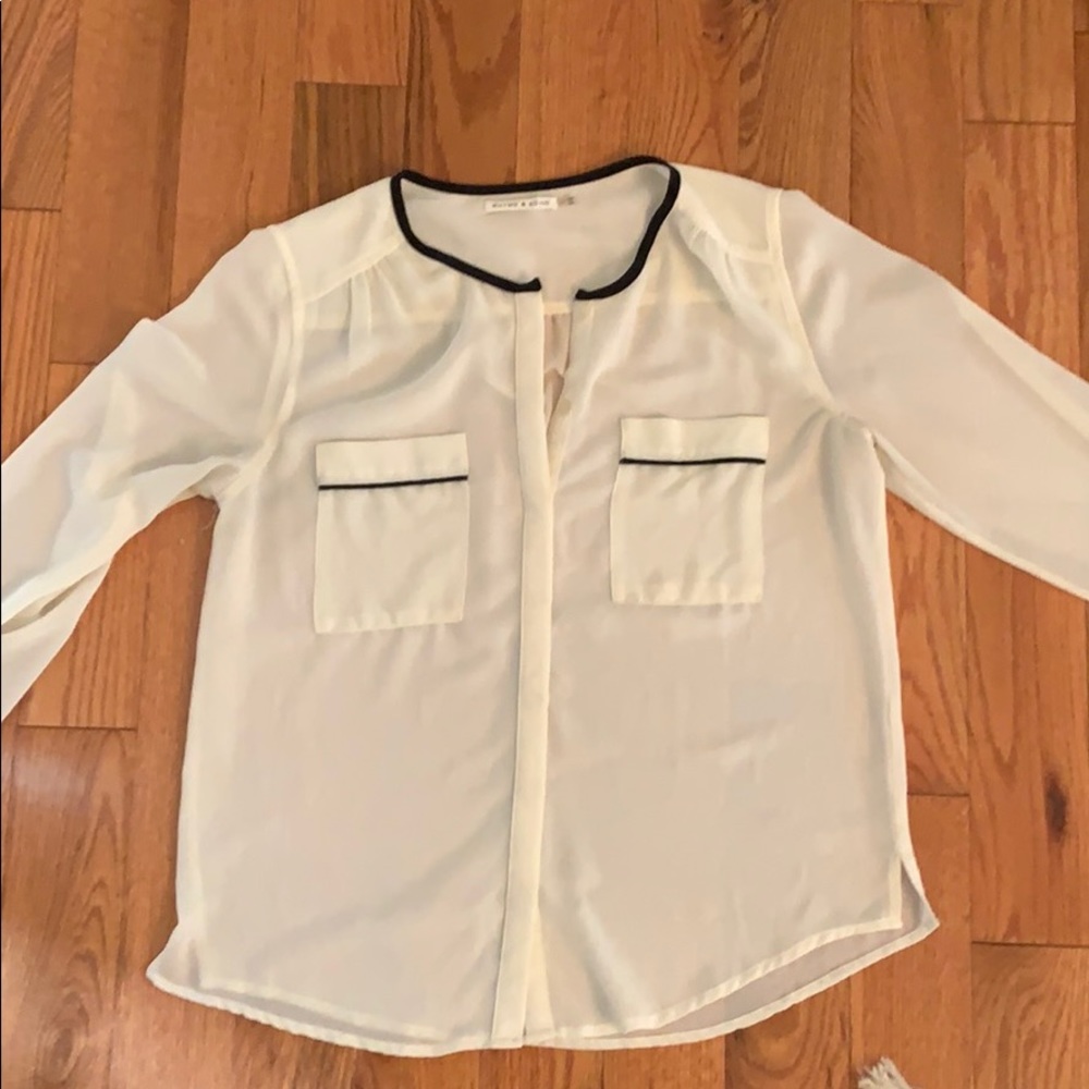 Cream and black blouse